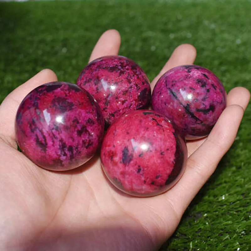 Natural Rhodonite Peach Blossom Stone Crystal Ball — 50–55mm Healing Sphere