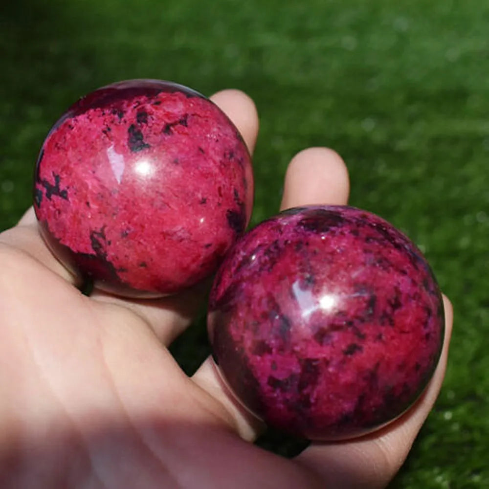 Natural Rhodonite Peach Blossom Stone Crystal Ball — 50–55mm Healing Sphere