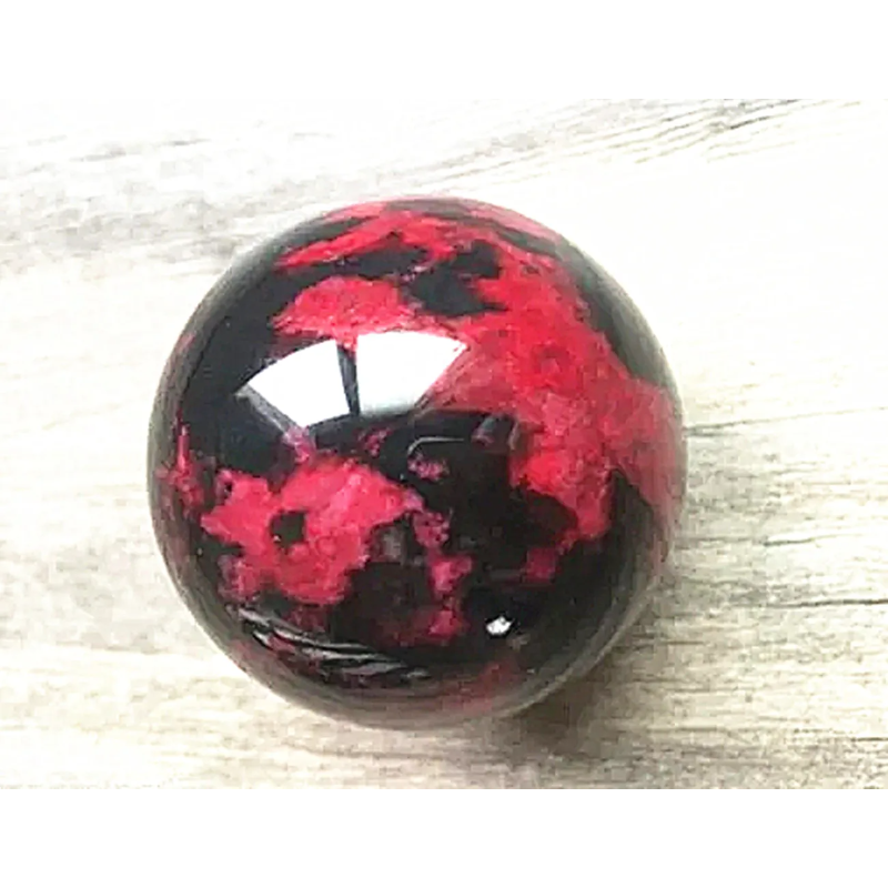 Natural Rhodonite Peach Blossom Stone Crystal Ball — Polished Healing Sphere, 50mm